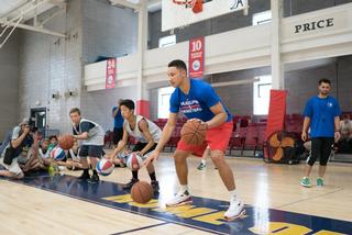Ben Simmons working with campers